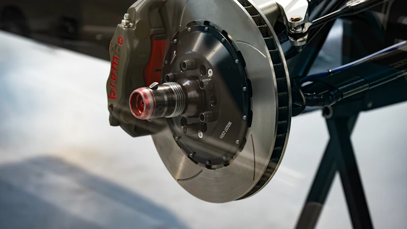 A brake disc and caliper on a car
