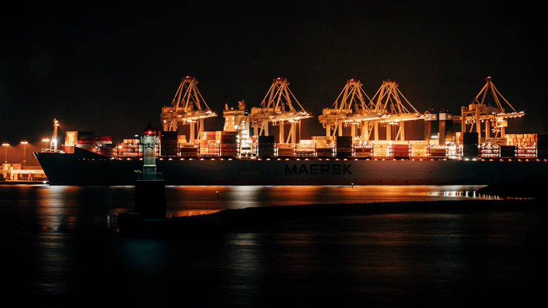Container cranes at a port at night